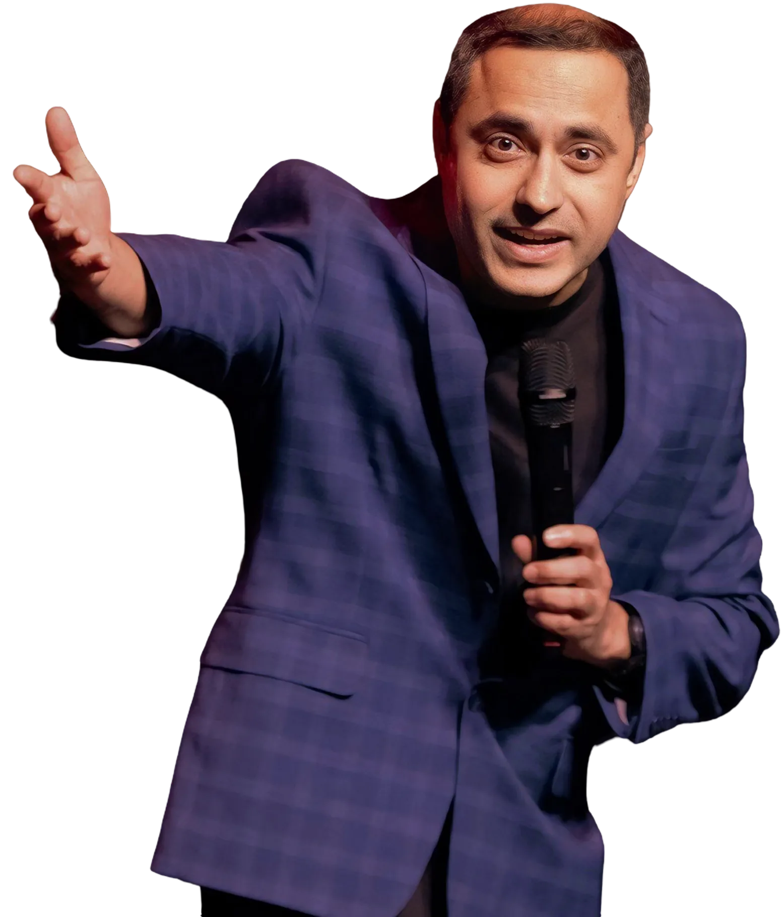 Seetha performing corporate stand-up comedy, holding a microphone